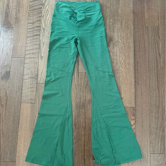 Green Flared Leggings with tie / cross detail on front - Picture 1 of 4